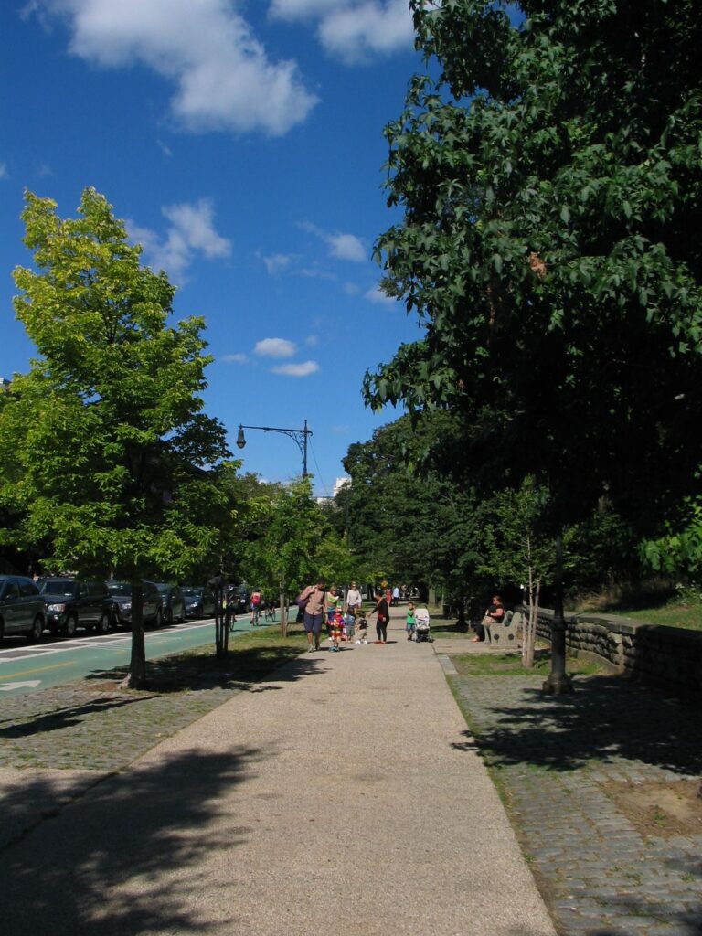 Morning Park Routes Get Lighting Upgrades for Winter people walking along a park path in the morning