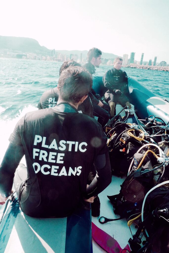 Enzymes That Break Down Plastic Move Toward Ocean Cleanup Waves breaking on a coastline during a cleanup