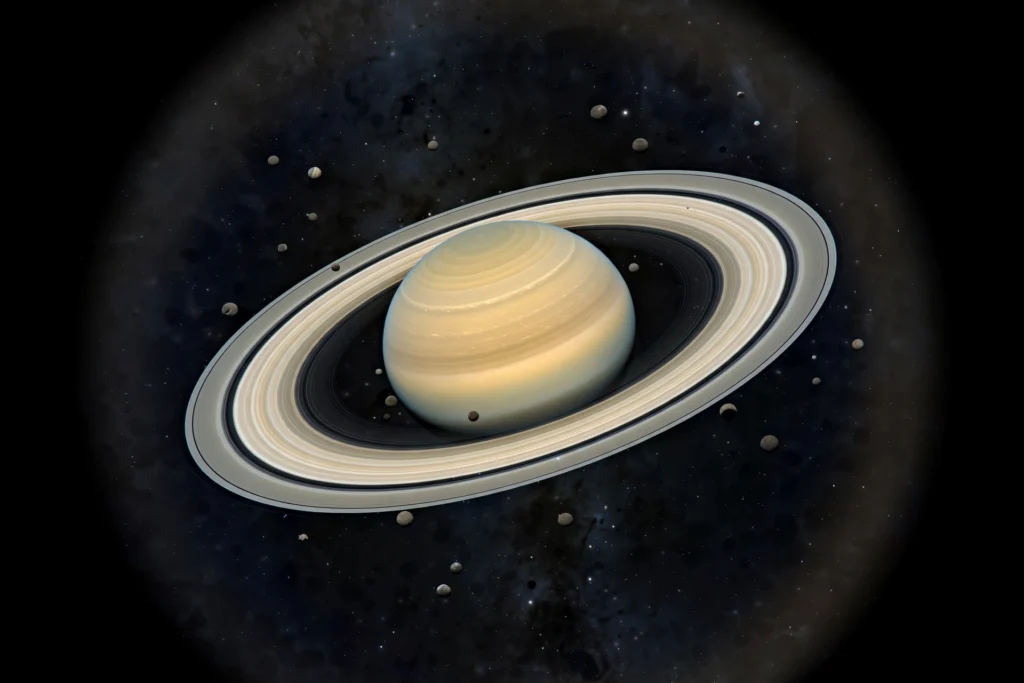 Why Saturn Now Boasts 274 Moons, Most in Solar System Saturn with its rings and many small moons in deep space